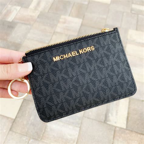 michael kors change purse black|Michael Kors repair customer service.